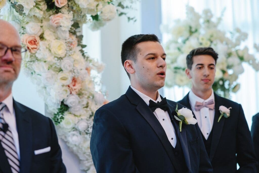 Groom seeing walk down the isle