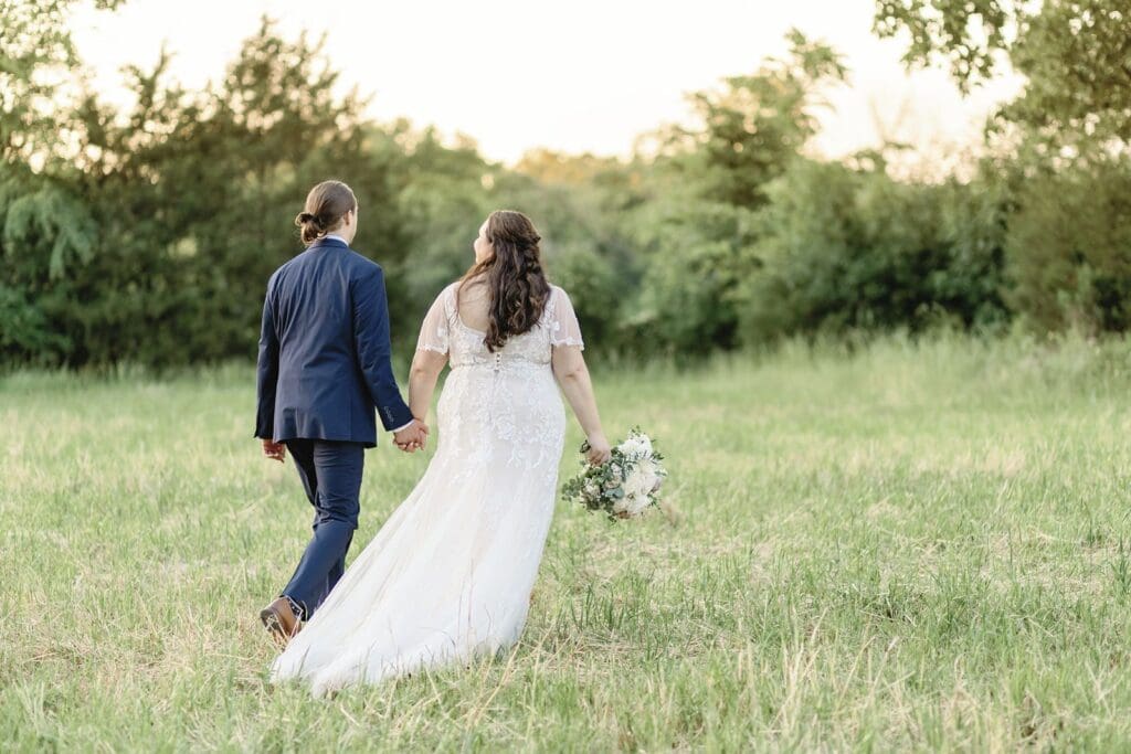 Bride and Groom peacefully and joyfully walking hand-in-hand